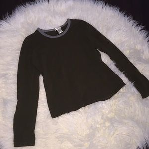 I am selling a beautiful long sleeved green shirt.